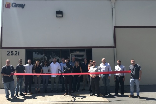 Gray team celebrates the opening of the new Sacramento office with a ribbon cutting ceremony.